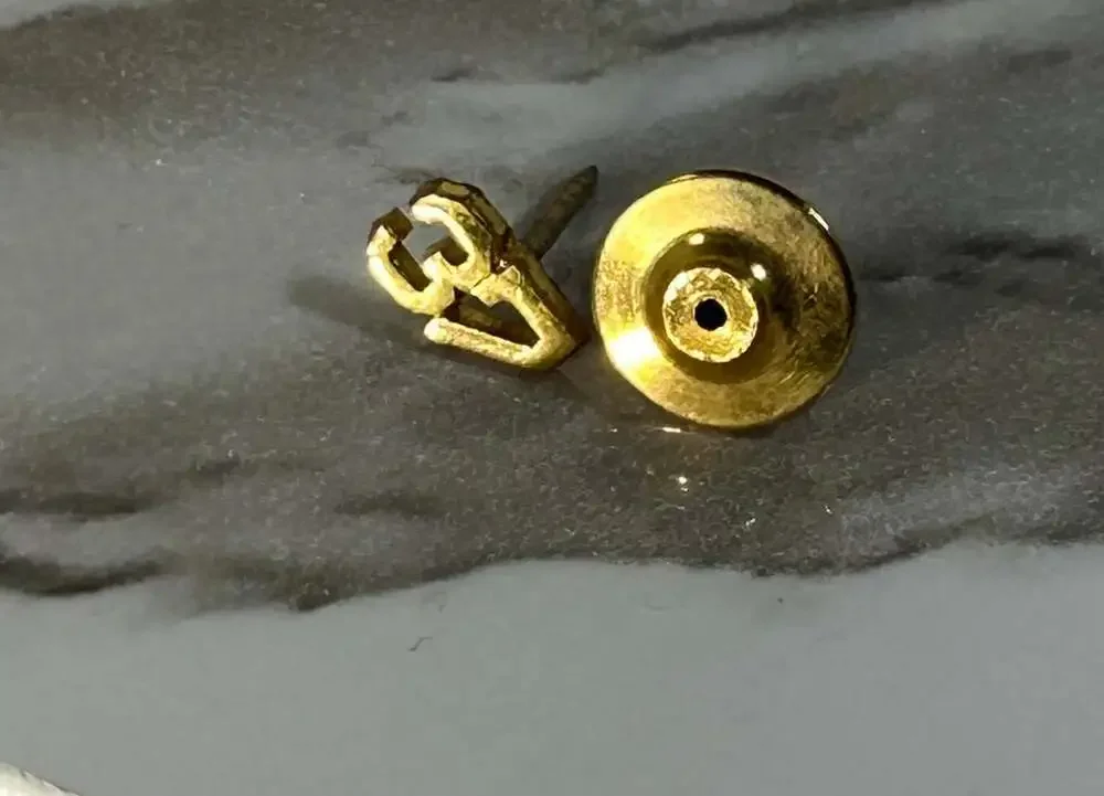 37 gold tone lapel pin